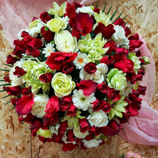 Composition florale funéraire - coussin rond - pièce unique