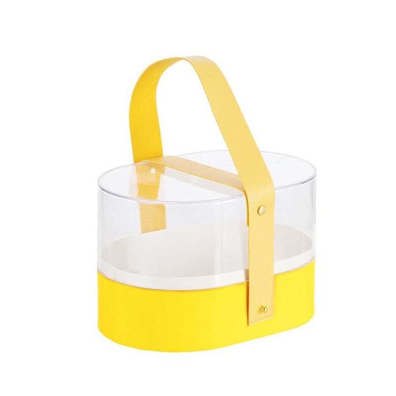 Boîte à fleurs ovale en plexiglas jaune avec anse 19 x 13 cm - grossiste en emballage fleuriste
