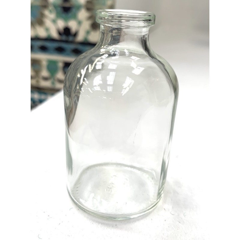 Petite fiole en verre H7,5 cm et ø4 cm Petite fiole en verre H7,5 cm et ø4 cm
